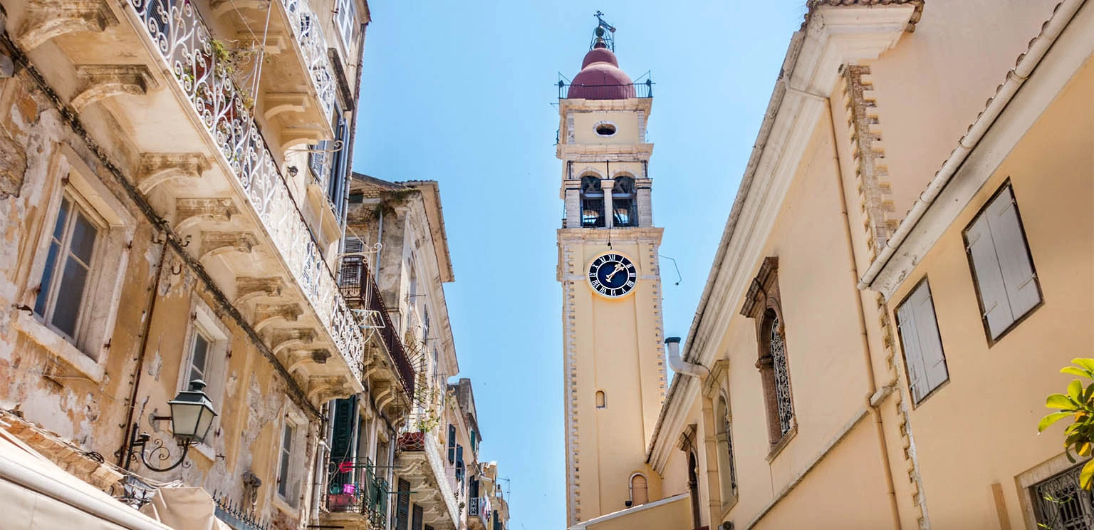 The distinctive red-domed bell tower of Saint Spyridon Church in corfu