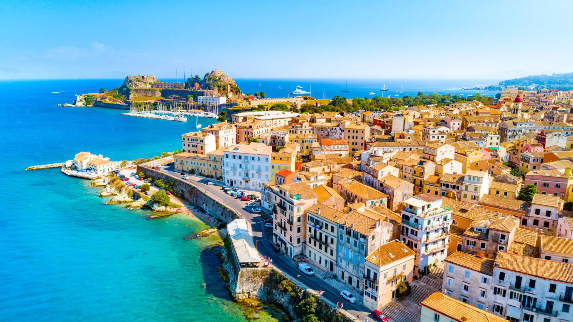 Aerial view of Corfu Town’s colorful buildings and coastline